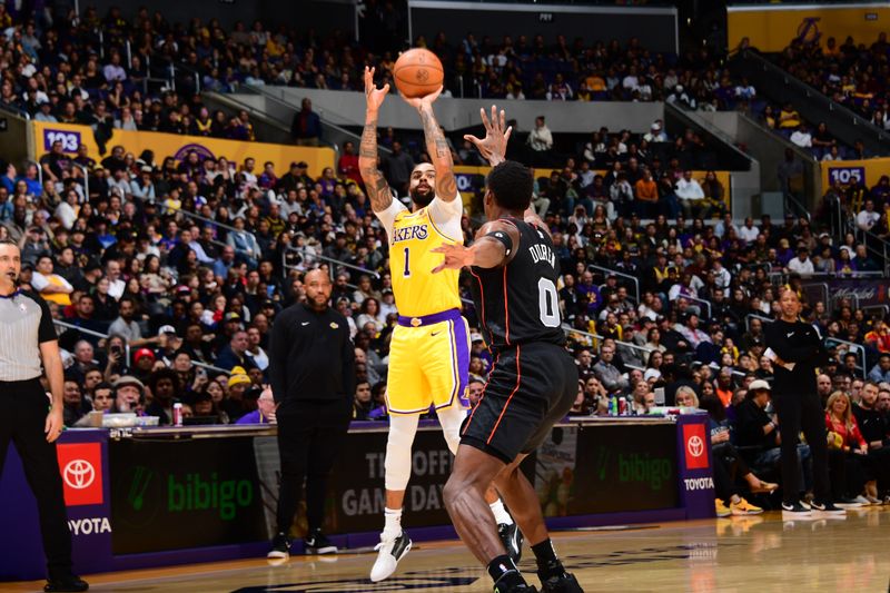 LOS ANGELES, CA - FEBRUARY 13: D'Angelo Russell #1 of the Los Angeles Lakers shoots the ball during the game against the Detroit Pistons on February 13, 2024 at Crypto.Com Arena in Los Angeles, California. NOTE TO USER: User expressly acknowledges and agrees that, by downloading and/or using this Photograph, user is consenting to the terms and conditions of the Getty Images License Agreement. Mandatory Copyright Notice: Copyright 2024 NBAE (Photo by Adam Pantozzi/NBAE via Getty Images)