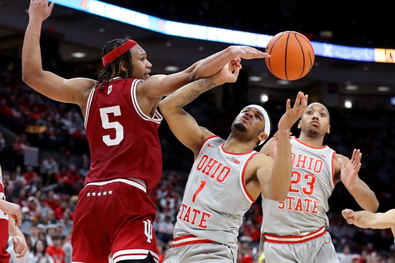 Feb 6, 2024; Columbus, Ohio, USA; Ohio State Buckeyes guard Roddy Gayle Jr. (1) loses control of the ball as Indiana Hoosiers forward Malik Reneau (5) defends during the second half at Value City Arena. Mandatory Credit: Joseph Maiorana-USA TODAY Sports