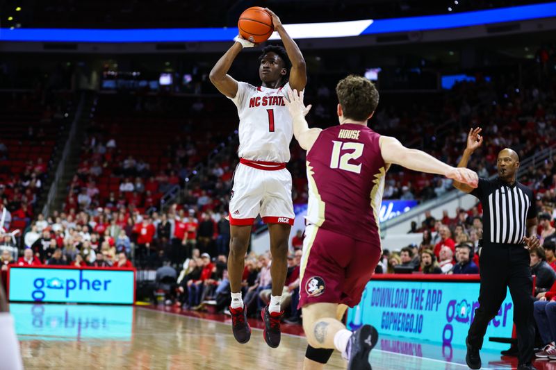 Feb 1, 2023; Raleigh, North Carolina, USA; North Carolina State Wolfpack guard Jarkel Joiner (1) shoots a three point basket during the first half against Florida State at PNC Arena.  Mandatory Credit: Jaylynn Nash-USA TODAY Sports