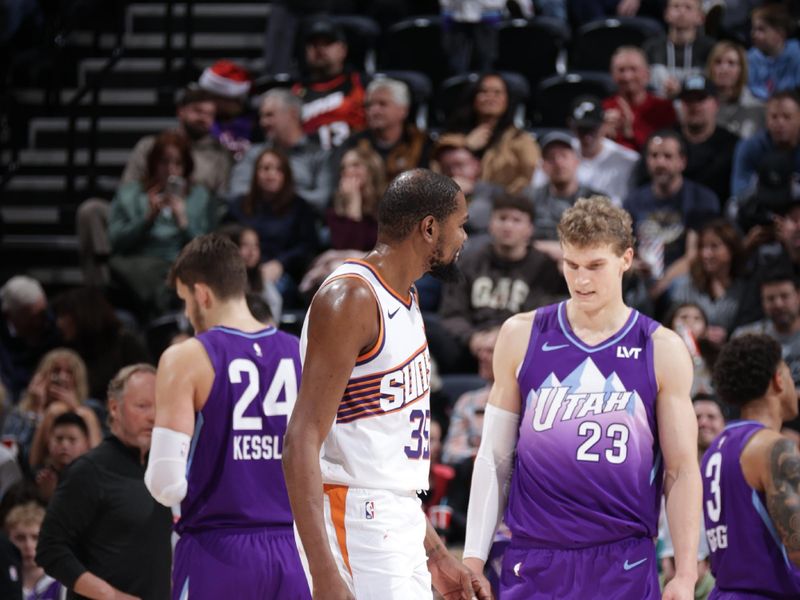 SALT LAKE CITY, UT - DECEMBER 13:  Kevin Durant #35 of the Phoenix Suns and Lauri Markkanen #23 of the Utah Jazz during the game during a regular season game on December 13, 2024 at Delta Center in Salt Lake City, Utah. NOTE TO USER: User expressly acknowledges and agrees that, by downloading and or using this Photograph, User is consenting to the terms and conditions of the Getty Images License Agreement. Mandatory Copyright Notice: Copyright 2024 NBAE (Photo by Melissa Majchrzak/NBAE via Getty Images)