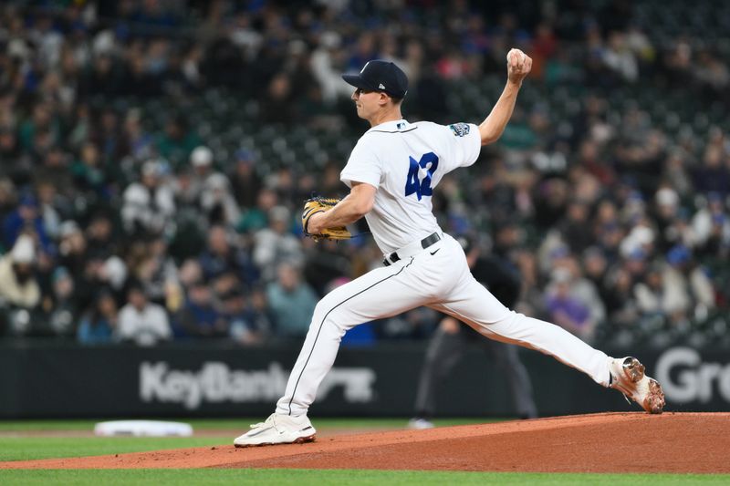 Apr 15, 2023; Seattle, Washington, USA; Seattle Mariners starting pitcher George Kirby pitches to the Colorado Rockies during the first inning at T-Mobile Park. Mandatory Credit: Steven Bisig-USA TODAY Sports