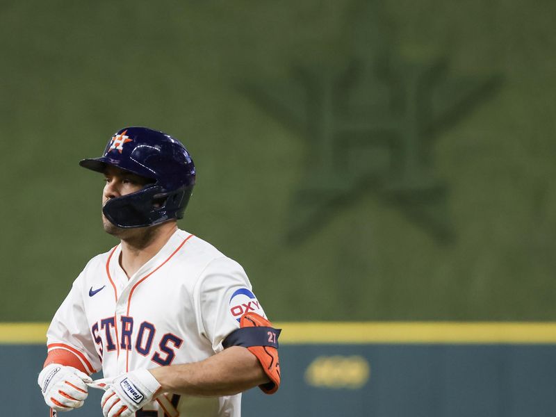 Jul 11, 2024; Houston, Texas, USA; Houston Astros second baseman Jose Altuve (27) reacts to his single against the Miami Marlins in the fourth inning at Minute Maid Park. Mandatory Credit: Thomas Shea-USA TODAY Sports