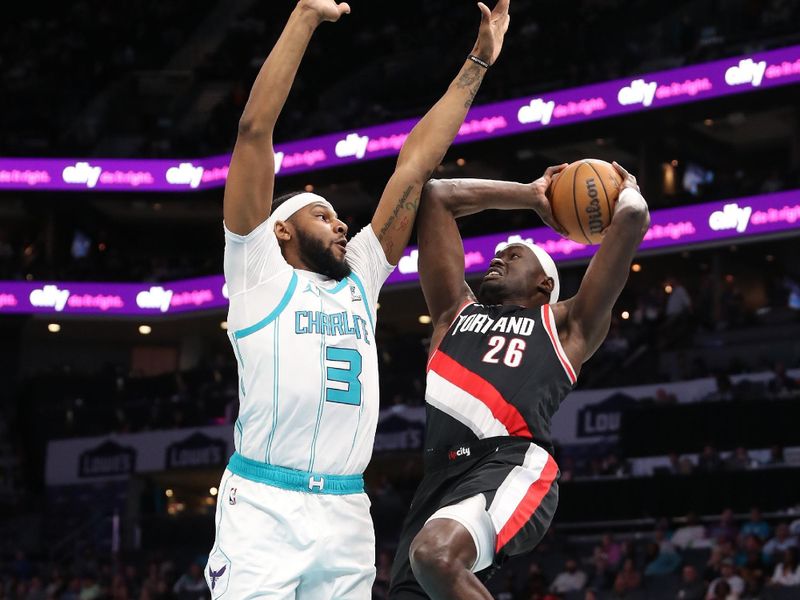 CHARLOTTE, NC - APRIL 3:  Duop Reath #26 of the Portland Trail Blazers shoots the ball during the game against the Charlotte Hornets on April 3, 2024 at Spectrum Center in Charlotte, North Carolina. NOTE TO USER: User expressly acknowledges and agrees that, by downloading and or using this photograph, User is consenting to the terms and conditions of the Getty Images License Agreement.  Mandatory Copyright Notice:  Copyright 2024 NBAE (Photo by Brock Williams-Smith/NBAE via Getty Images)