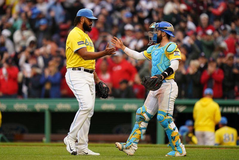 Apr 14, 2024; Boston, Massachusetts, USA; Boston Red Sox relief pitcher Kenley Jansen (74) is congratulated by catcher Connor Wong (12) after striking out Los Angeles Angels center fielder Mike Trout (27) (not pictured) to end the game in the ninth inning at Fenway Park. Mandatory Credit: David Butler II-USA TODAY Sports
