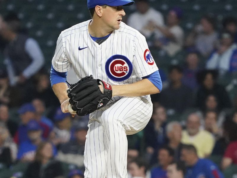 Sep 21, 2023; Chicago, Illinois, USA; Chicago Cubs starting pitcher Kyle Hendricks (28) throws the ball against the Pittsburgh Pirates during the first inning at Wrigley Field. Mandatory Credit: David Banks-USA TODAY Sports