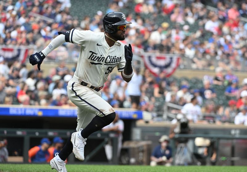 Sep 10, 2023; Minneapolis, Minnesota, USA; Minnesota Twins left fielder Willi Castro (50) hits a triple against the New York Mets in the seventh inning at Target Field. Mandatory Credit: Michael McLoone-USA TODAY Sports