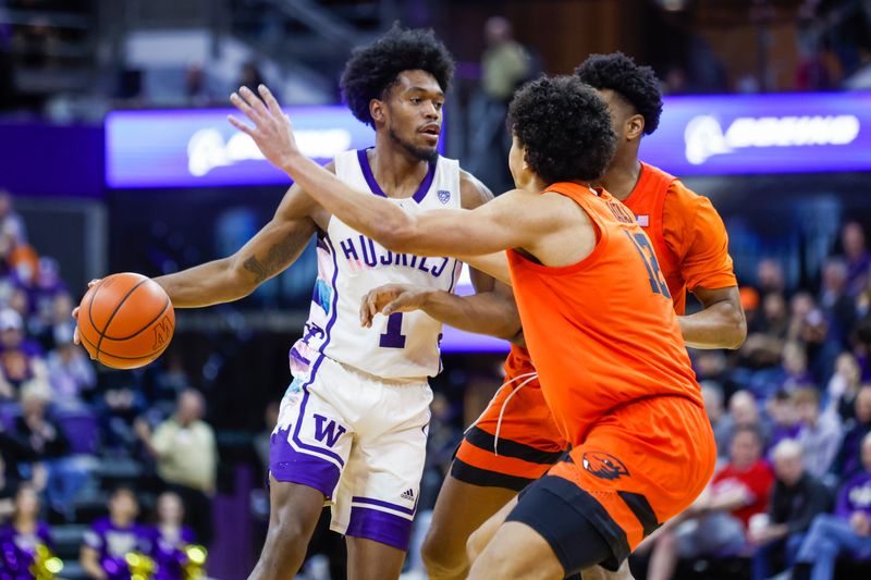 Feb 18, 2023; Seattle, Washington, USA; Washington Huskies forward Keion Brooks (1) dribbles against an Oregon State Beavers double team during the second half at Alaska Airlines Arena at Hec Edmundson Pavilion. Mandatory Credit: Joe Nicholson-USA TODAY Sports