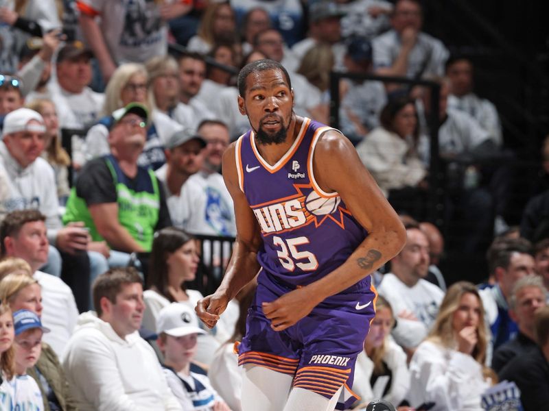 MINNEAPOLIS, MN -  APRIL 23: Kevin Durant #35 of the Phoenix Suns looks on during the game against the Minnesota Timberwolves during Round 1 Game 2 of the 2024 NBA Playoffs on April 23, 2024 at Target Center in Minneapolis, Minnesota. NOTE TO USER: User expressly acknowledges and agrees that, by downloading and or using this Photograph, user is consenting to the terms and conditions of the Getty Images License Agreement. Mandatory Copyright Notice: Copyright 2024 NBAE (Photo by David Sherman/NBAE via Getty Images)