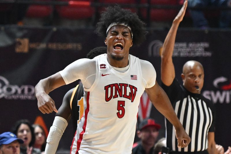 Feb 3, 2024; Las Vegas, Nevada, USA; UNLV Rebels forward Rob Whaley Jr. (5) reacts to a play against the Wyoming Cowboys in the second half at Thomas & Mack Center. Mandatory Credit: Candice Ward-USA TODAY Sports