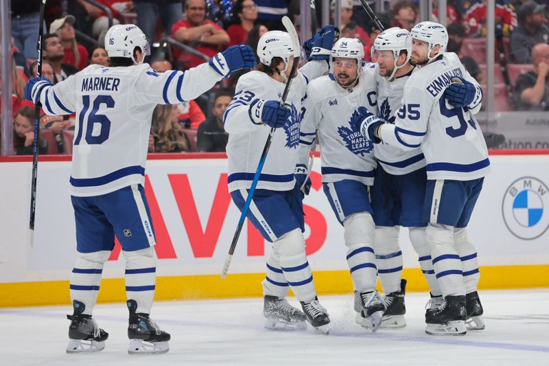 May 9, 2025; Sunrise, Florida, USA; Toronto Maple Leafs defenseman Morgan Rielly (44) celebrates with teammates after scoring against the Florida Panthers during the third period in game three of the second round of the 2025 Stanley Cup Playoffs at Amerant Bank Arena. Mandatory Credit: Sam Navarro-Imagn Images