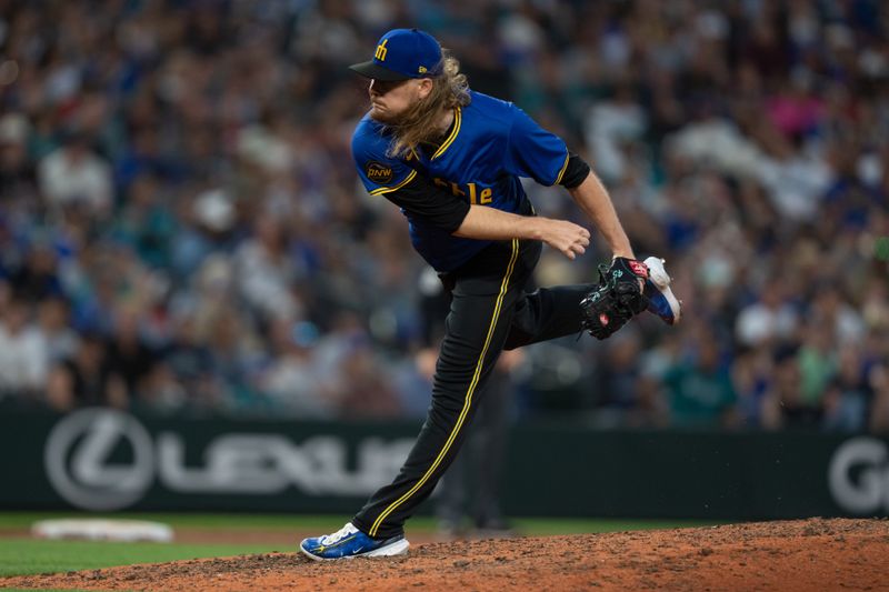 Jun 28, 2024; Seattle, Washington, USA; Seattle Mariners reliever Ryne Stanek (45) delivers a pitch during the tenth inning against the Minnesota Twins at T-Mobile Park. Mandatory Credit: Stephen Brashear-USA TODAY Sports