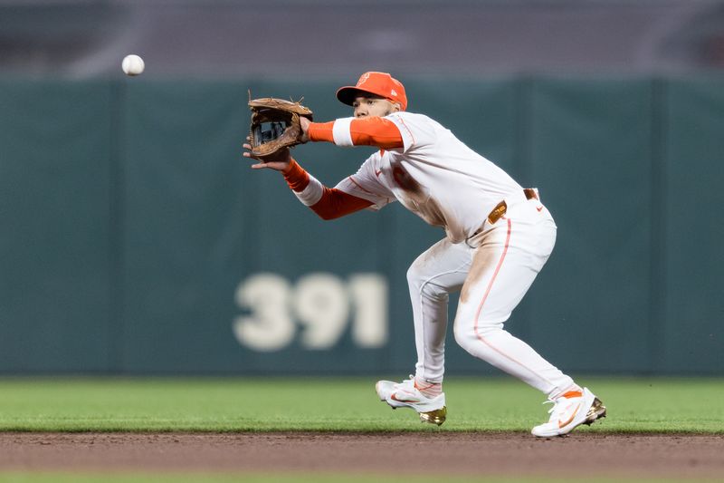 Jun 25, 2024; San Francisco, California, USA; San Francisco Giants second baseman Thairo Estrada (39) catches a shallow fly ball for an out against the Chicago Cubs during the eighth inning at Oracle Park. Mandatory Credit: John Hefti-USA TODAY Sports