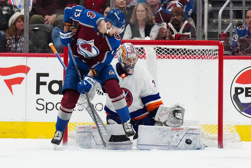 Jan 2, 2024; Denver, Colorado, USA; New York Islanders goaltender Ilya Sorokin (30) makes a pad save on Colorado Avalanche right wing Valeri Nichushkin (13) in the third period at Ball Arena. Mandatory Credit: Ron Chenoy-USA TODAY Sports