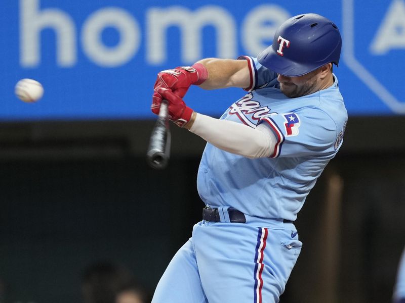 Aug 20, 2023; Arlington, Texas, USA; Texas Rangers designated hitter Robbie Grossman (4) singles against the Milwaukee Brewers during the seventh inning at Globe Life Field. Mandatory Credit: Jim Cowsert-USA TODAY Sports