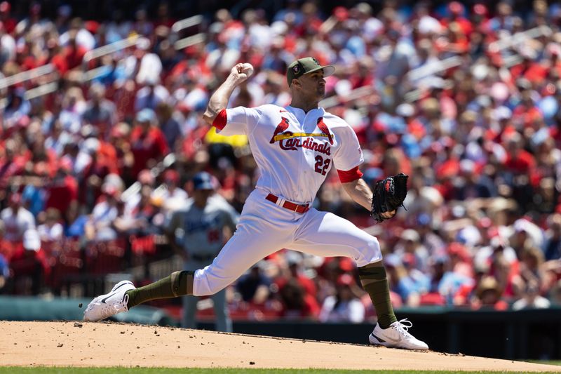 May 21, 2023; St. Louis, Missouri, USA; St. Louis Cardinals pitcher Jack Flaherty (22) pitches against the Los Angeles Dodgers during the first inning at Busch Stadium. Mandatory Credit: Zach Dalin-USA TODAY Sports