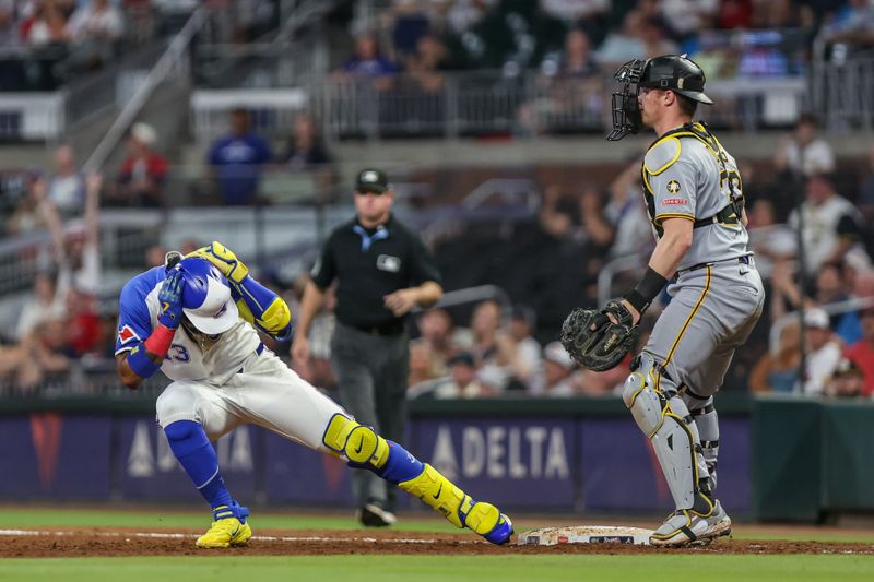 Sep 27, 2025; Cumberland, Georgia, USA; Atlanta Braves outfielder Ronald Acuna Jr. (13) runs back to first base after a hit against the Pittsburgh Pirates during the ninth inning at Truist Park. Mandatory Credit: Jordan Godfree-Imagn Images