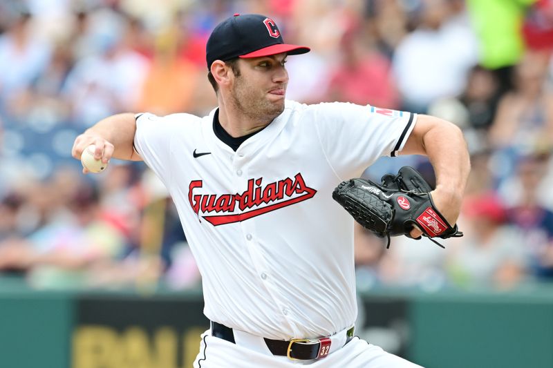 Jul 25, 2024; Cleveland, Ohio, USA; Cleveland Guardians starting pitcher Gavin Williams (32) throws a pitch during the first inning against the Detroit Tigers at Progressive Field. Mandatory Credit: Ken Blaze-USA TODAY Sports