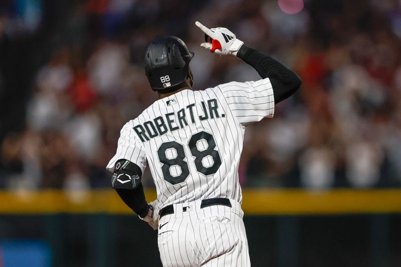 Jul 4, 2023; Chicago, Illinois, USA; Chicago White Sox center fielder Luis Robert Jr. (88) rounds the bases after hitting a three-run home run against the Toronto Blue Jays during the sixth inning at Guaranteed Rate Field. Mandatory Credit: Kamil Krzaczynski-USA TODAY Sports