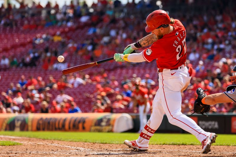 Sep 5, 2024; Cincinnati, Ohio, USA; Cincinnati Reds outfielder Jake Fraley (27) hits a double against the Houston Astros in the seventh inning at Great American Ball Park. Mandatory Credit: Katie Stratman-Imagn Images