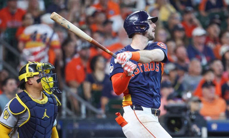 May 19, 2024; Houston, Texas, USA; Houston Astros right fielder Kyle Tucker (30) hits a three-run home run during the seventh inning against the Milwaukee Brewers at Minute Maid Park. Mandatory Credit: Troy Taormina-USA TODAY Sports