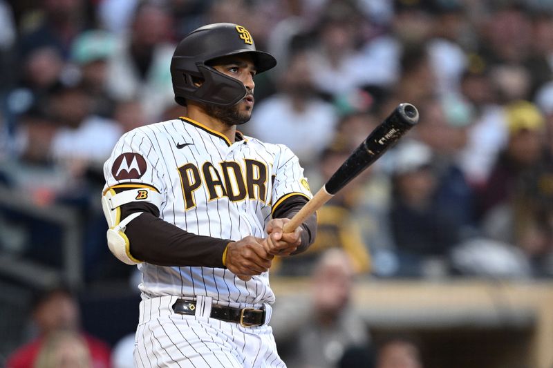 Jun 15, 2023; San Diego, California, USA; San Diego Padres center fielder Trent Grisham (1) watches his RBI double during the fifth inning against the Cleveland Guardians at Petco Park. Mandatory Credit: Orlando Ramirez-USA TODAY Sports