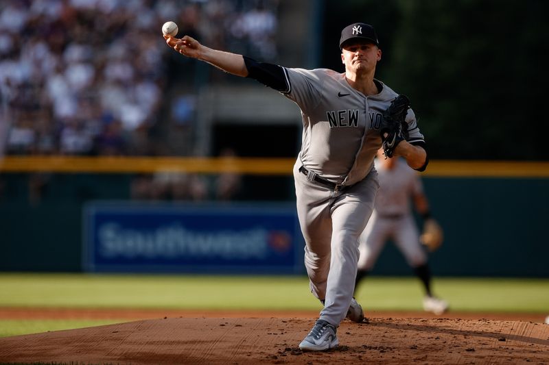 Jul 15, 2023; Denver, Colorado, USA; New York Yankees starting pitcher Clarke Schmidt (36) pitches in the first inning against the Colorado Rockies at Coors Field. Mandatory Credit: Isaiah J. Downing-USA TODAY Sports