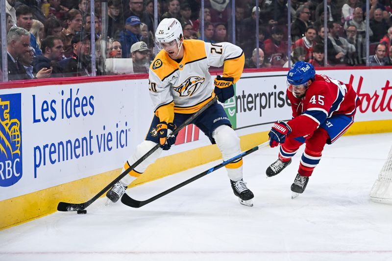 Oct 16, 2025; Montreal, Quebec, CAN; Montreal Canadiens defenseman Alexandre Carrier (45) defends against Nashville Predators defenseman Justin Barron (20) during the first period at Bell Centre. Mandatory Credit: David Kirouac-Imagn Images