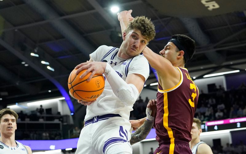 Mar 9, 2024; Evanston, Illinois, USA; Northwestern Wildcats forward Nick Martinelli (2) and Minnesota Golden Gophers forward Dawson Garcia (3) go for the ball during the first half at Welsh-Ryan Arena. Mandatory Credit: David Banks-USA TODAY Sports