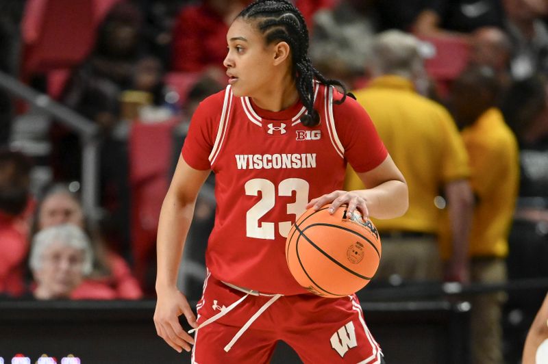 Feb 29, 2024; College Park, Maryland, USA;  Wisconsin Badgers guard D'Yanis Jimenez (23) dribbles during the first half against the Maryland Terrapins at Xfinity Center. Mandatory Credit: Tommy Gilligan-USA TODAY Sports