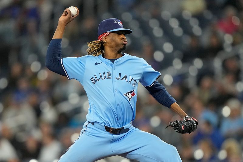 May 29, 2025; Toronto, Ontario, CAN; Toronto Blue Jays pitcher Jose Urena (48) pitches to the Athletics during the eighth inning at Rogers Centre. Mandatory Credit: John E. Sokolowski-Imagn Images
