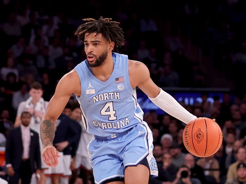 Dec 5, 2023; New York, New York, USA; North Carolina Tar Heels guard RJ Davis (4) controls the ball against the Connecticut Huskies during the second half at Madison Square Garden. Mandatory Credit: Brad Penner-USA TODAY Sports