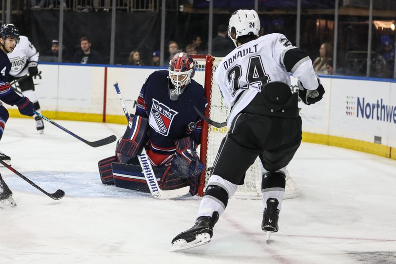 Dec 14, 2024; New York, New York, USA;  New York Rangers goaltender Igor Shesterkin (31) makes a save on a shot on goal attempt by Los Angeles Kings center Phillip Danault (24) in the first period at Madison Square Garden. Mandatory Credit: Wendell Cruz-Imagn Images