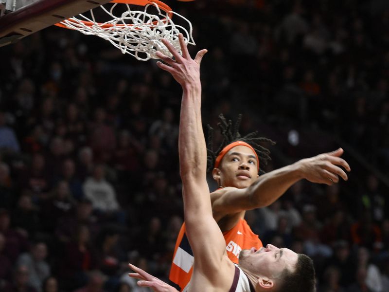 Jan 28, 2023; Blacksburg, Virginia, USA; Syracuse Orange forward Benny Williams (13) defends at the basket against Virginia Tech Hokies forward John Camden (11) in the second half at Cassell Coliseum. Mandatory Credit: Lee Luther Jr.-USA TODAY Sports