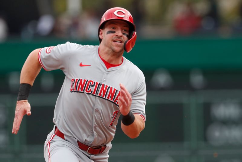 Aug 25, 2024; Pittsburgh, Pennsylvania, USA; Cincinnati Reds left fielder Spencer Steer (7) runs from first base to third base against the Pittsburgh Pirates during the sixth inning at PNC Park. Mandatory Credit: Charles LeClaire-USA TODAY Sports