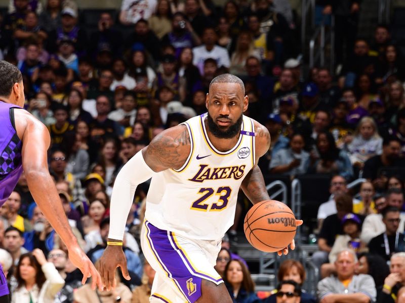 LOS ANGELES, CA - OCTOBER 26: LeBron James #23 of the Los Angeles Lakers dribbles the ball during the game against the Sacramento Kings on October 26, 2024 at Crypto.Com Arena in Los Angeles, California. NOTE TO USER: User expressly acknowledges and agrees that, by downloading and/or using this Photograph, user is consenting to the terms and conditions of the Getty Images License Agreement. Mandatory Copyright Notice: Copyright 2024 NBAE (Photo by Adam Pantozzi/NBAE via Getty Images)
