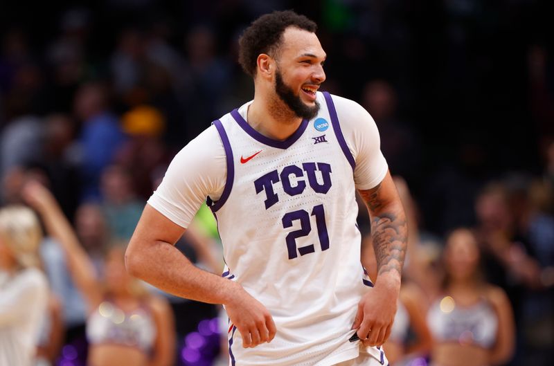 Mar 17, 2023; Denver, CO, USA; TCU Horned Frogs forward JaKobe Coles (21) reacts after defeating the Arizona State Sun Devils in the first round of the NCAA tournament at Ball Arena. Mandatory Credit: Michael Ciaglo-USA TODAY Sports