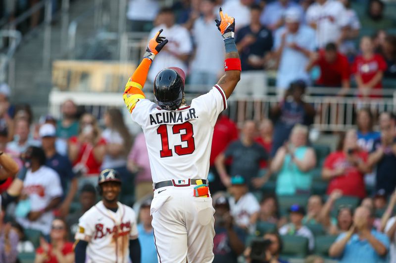 Jun 27, 2023; Atlanta, Georgia, USA; Atlanta Braves right fielder Ronald Acuna Jr. (13) celebrates after a home run against the Minnesota Twins in the second inning at Truist Park. Mandatory Credit: Brett Davis-USA TODAY Sports
