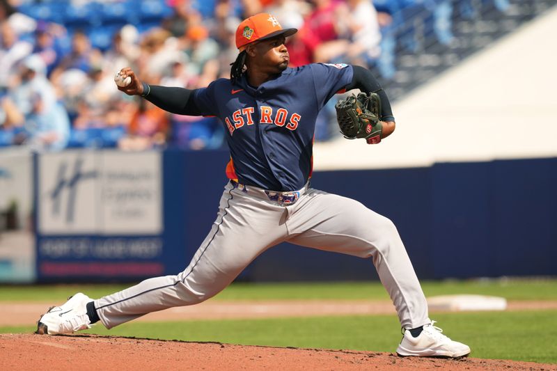 Mar 1, 2026; Port St. Lucie, Florida, USA;  Houston Astros pitcher Alimber Santa (75) pitches in the fourth inning against the New York Mets at Clover Park. Mandatory Credit: Jim Rassol-Imagn Images