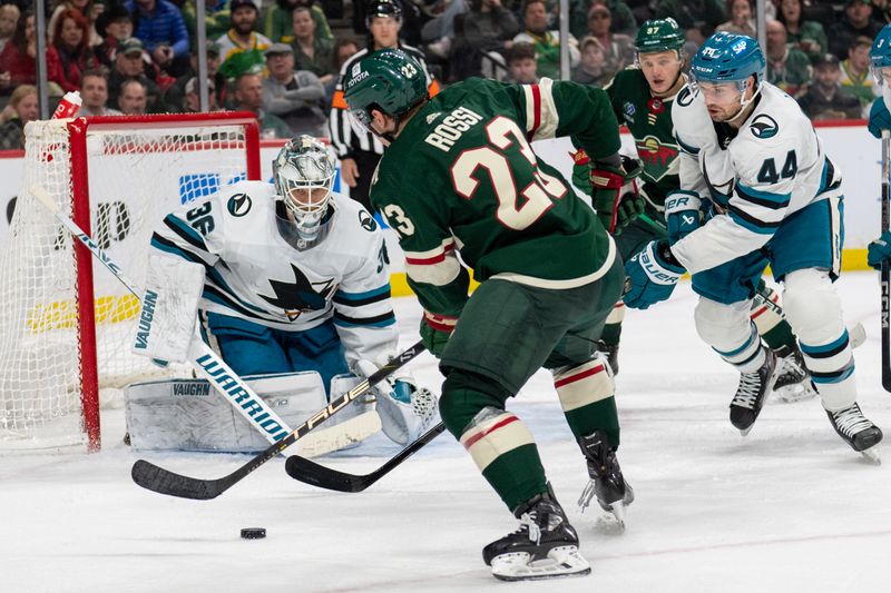 Mar 3, 2024; Saint Paul, Minnesota, USA; Minnesota Wild center Marco Rossi (23) shoots on San Jose Sharks goaltender Kaapo Kahkonen (36) in the second period at Xcel Energy Center. Mandatory Credit: Matt Blewett-USA TODAY Sports