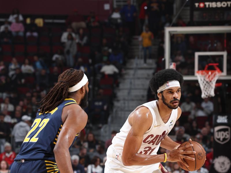 Cleveland, OH - OCTOBER 10: Jarrett Allen #31 of the Cleveland Cavaliers looks to pass the ball during the game against the Indiana Pacers during a NBA pre season game on October 10, 2024 at Rocket Mortgage Fieldhouse in Cleveland, Ohio. NOTE TO USER: User expressly acknowledges and agrees that, by downloading and or using this photograph, User is consenting to the terms and conditions of the Getty Images License Agreement. Mandatory Copyright Notice: Copyright 2024 NBAE (Photo by Jeff Haynes/NBAE via Getty Images)