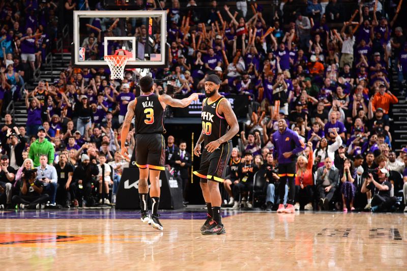 PHOENIX, AZ - APRIL  28: The Phoenix Suns celebrate during the game against the Minnesota Timberwolves during Round 1 Game 4 of the 2024 NBA Playoffs on April 28, 2024 at Footprint Center in Phoenix, Arizona. NOTE TO USER: User expressly acknowledges and agrees that, by downloading and or using this photograph, user is consenting to the terms and conditions of the Getty Images License Agreement. Mandatory Copyright Notice: Copyright 2024 NBAE (Photo by Kate Frese/NBAE via Getty Images)