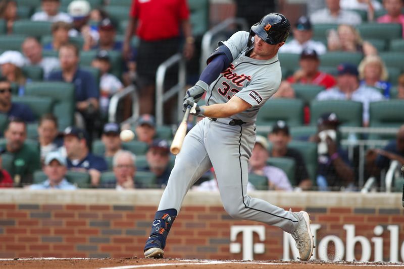 Jun 18, 2024; Atlanta, Georgia, USA; Detroit Tigers second baseman Colt Keith (33) hits a single against the Atlanta Braves in the second inning at Truist Park. Mandatory Credit: Brett Davis-USA TODAY Sports