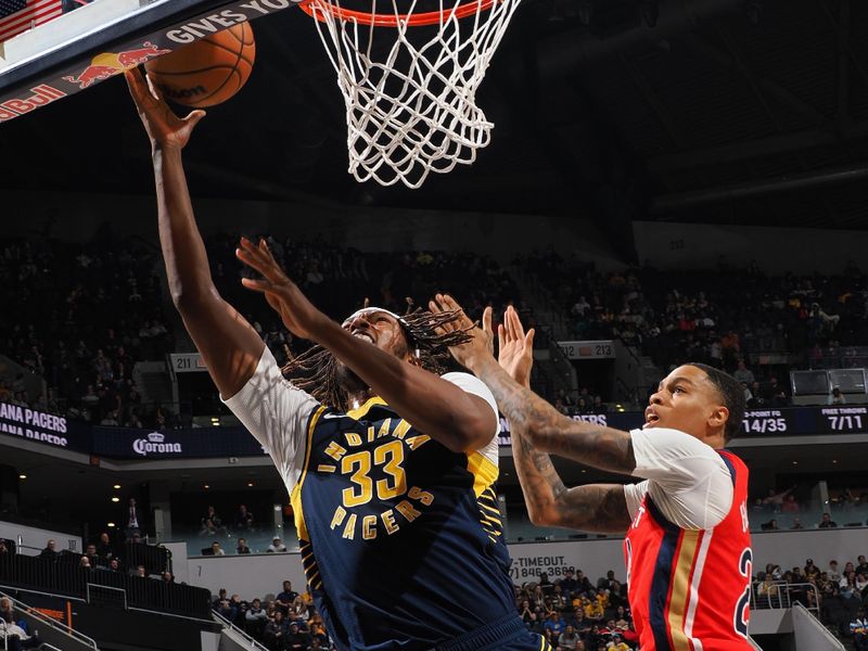 INDIANAPOLIS, IN - NOVEMBER 25: Myles Turner #33 of the Indiana Pacers drives to the basket during the game against the New Orleans Pelicans on November 25, 2024 at Gainbridge Fieldhouse in Indianapolis, Indiana. NOTE TO USER: User expressly acknowledges and agrees that, by downloading and or using this Photograph, user is consenting to the terms and conditions of the Getty Images License Agreement. Mandatory Copyright Notice: Copyright 2024 NBAE (Photo by Ron Hoskins/NBAE via Getty Images)