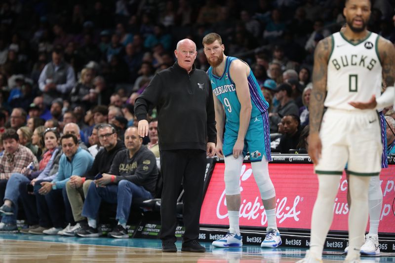 CHARLOTTE, NC - FEBRUARY 29: Head Coach Steve Clifford of the Charlotte Hornets and Davis Bertans #9 talk during the game Milwaukee Bucks on February 29, 2024 at Spectrum Center in Charlotte, North Carolina. NOTE TO USER: User expressly acknowledges and agrees that, by downloading and or using this photograph, User is consenting to the terms and conditions of the Getty Images License Agreement.  Mandatory Copyright Notice:  Copyright 2024 NBAE (Photo by Brock Williams-Smith/NBAE via Getty Images)