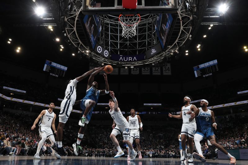 MINNEAPOLIS, MN -  FEBRUARY 28:  Anthony Edwards #5 of the Minnesota Timberwolves drives to the basket during the game against the Memphis Grizzlies on February 28, 2024 at Target Center in Minneapolis, Minnesota. NOTE TO USER: User expressly acknowledges and agrees that, by downloading and or using this Photograph, user is consenting to the terms and conditions of the Getty Images License Agreement. Mandatory Copyright Notice: Copyright 2024 NBAE (Photo by Jordan Johnson/NBAE via Getty Images)