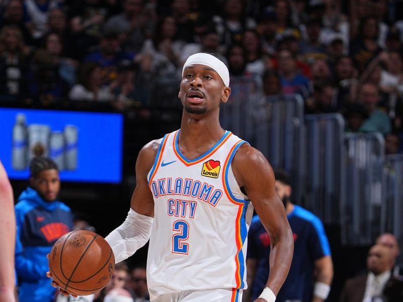 DENVER, CO - MAY 9:   Shai Gilgeous-Alexander #2 of the Oklahoma City Thunder dribbles the ball during the game against the Denver Nuggets during Round Two Game Three of the 2025 NBA Playoffs on May 9, 2025 at Ball Arena in Denver, Colorado. NOTE TO USER: User expressly acknowledges and agrees that, by downloading and/or using this Photograph, user is consenting to the terms and conditions of the Getty Images License Agreement. Mandatory Copyright Notice: Copyright 2025 NBAE (Photo by Garrett Ellwood/NBAE via Getty Images)