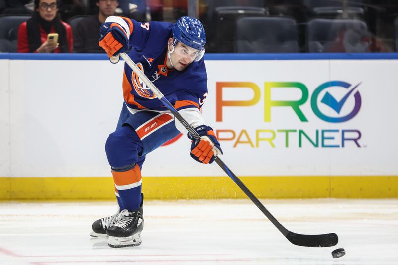 Jan 16, 2025; Elmont, New York, USA;  New York Islanders defenseman Adam Pelech (3) makes a pass in the third period against the Philadelphia Flyers at UBS Arena. Mandatory Credit: Wendell Cruz-Imagn Images