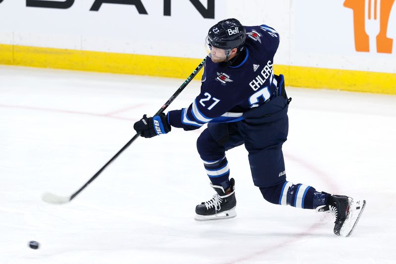 Jan 2, 2024; Winnipeg, Manitoba, CAN; Winnipeg Jets left wing Nikolaj Ehlers (27) warms up before a game against the Tampa Bay Lightning at Canada Life Centre. Mandatory Credit: James Carey Lauder-USA TODAY Sports