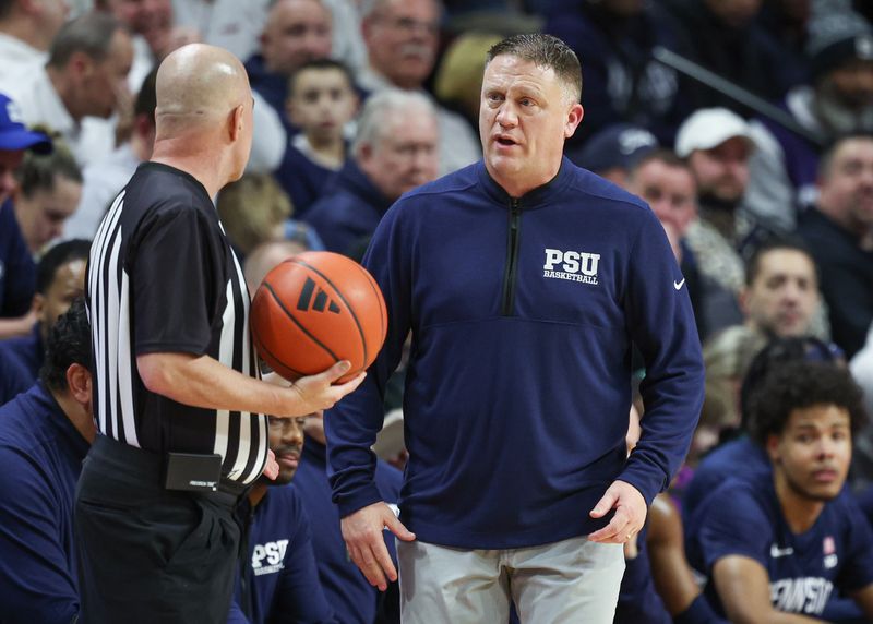 Jan 31, 2024; Piscataway, New Jersey, USA; Penn State Nittany Lions head coach Mike Rhoades talks with an official during the first half against the Rutgers Scarlet Knights at Jersey Mike's Arena. Mandatory Credit: Vincent Carchietta-USA TODAY Sports