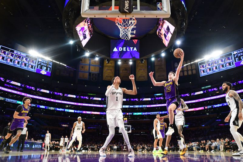 LOS ANGELES, CA - FEBRUARY 23:  Austin Reaves #15 of the Los Angeles Lakers goes to the basket during the game on February 23, 2024 at Crypto.Com Arena in Los Angeles, California. NOTE TO USER: User expressly acknowledges and agrees that, by downloading and/or using this Photograph, user is consenting to the terms and conditions of the Getty Images License Agreement. Mandatory Copyright Notice: Copyright 2024 NBAE (Photo by Adam Pantozzi/NBAE via Getty Images)